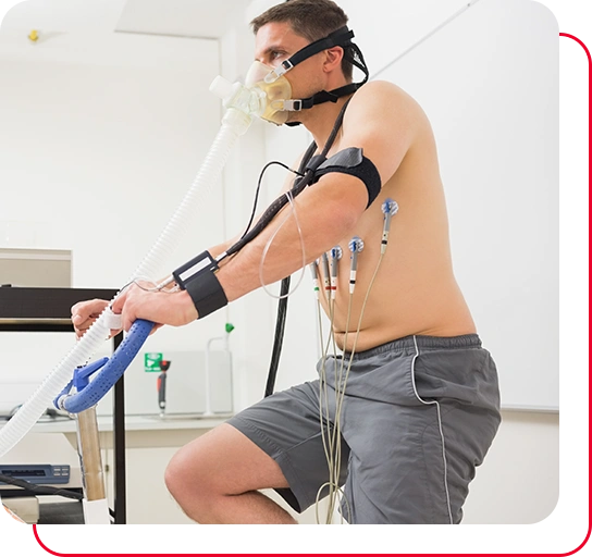 Man doing fitness test on exercise bike at the medical centre