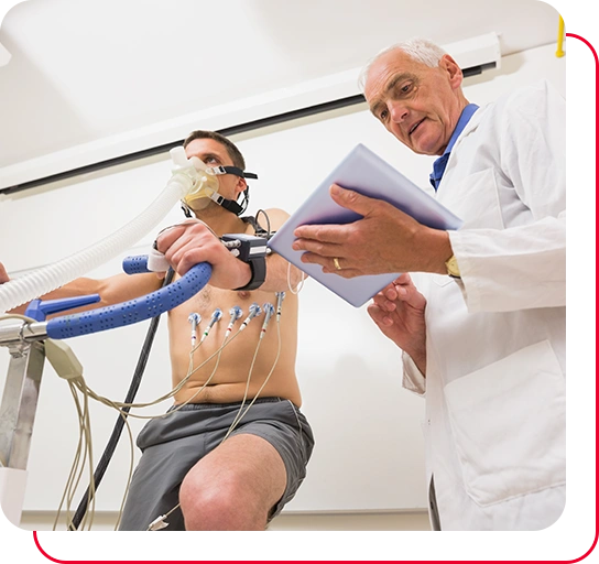 Man doing fitness test on exercise bike at the medical centre